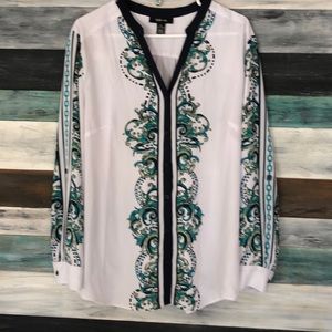 Long sleeve v-neck blouse.